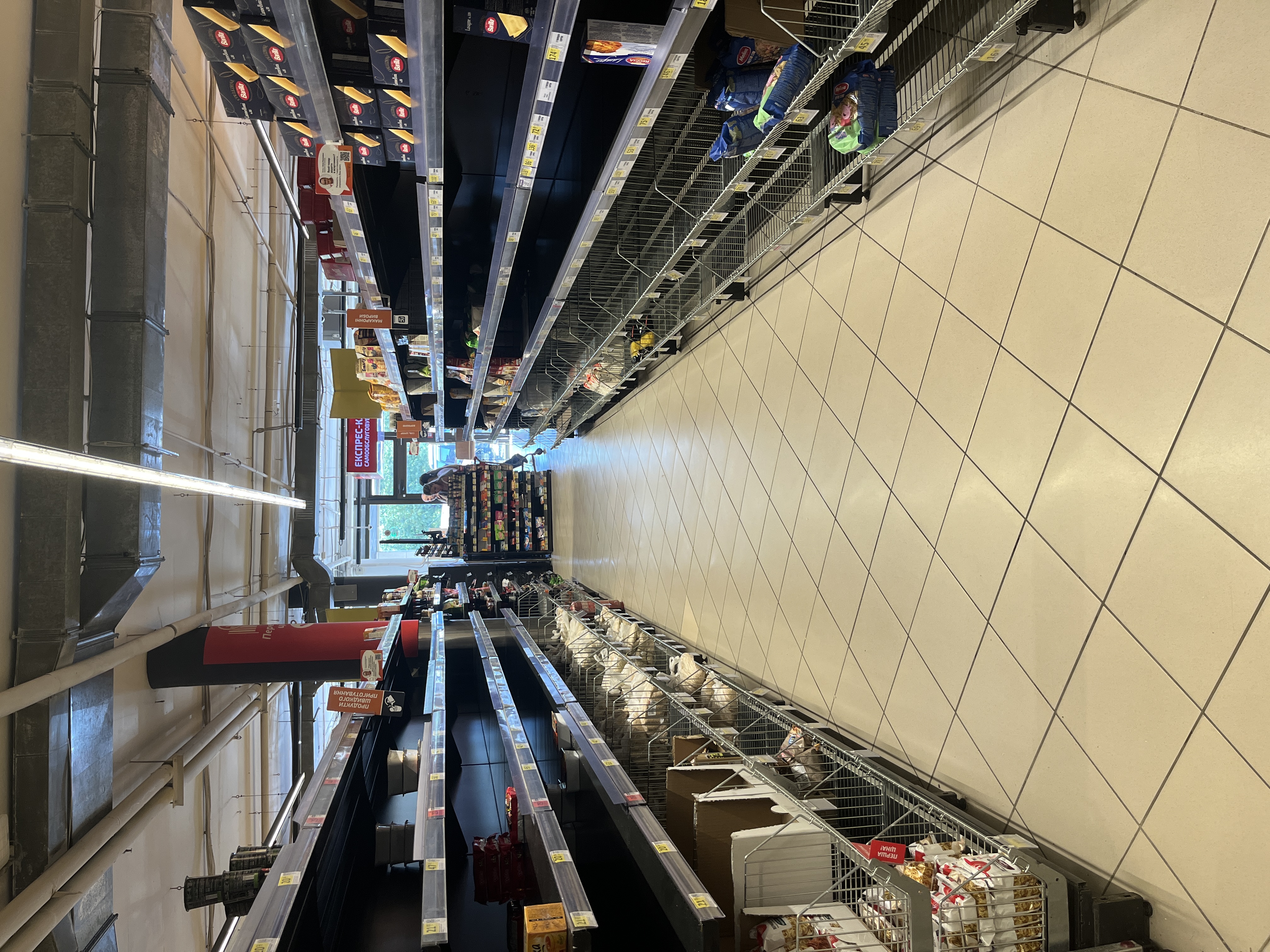 Empty shelves in a Kyiv supermarket following Russian strikes on warehouses and shopping centres. Photo credit: Kateryna Zudenkova