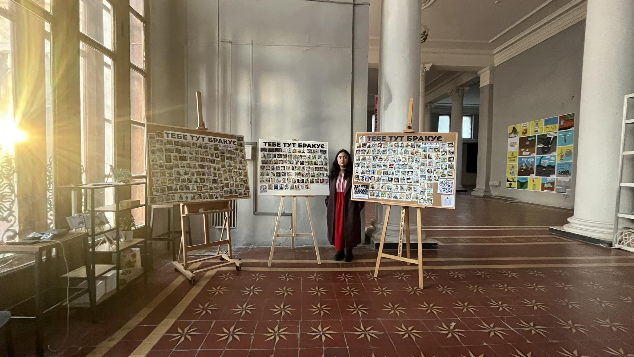 “You Are Missing Here” stands, where festival visitors could print a photo of a fallen defender. Over three days of the festival, more than 300 photos were printed. Photo by Memorial.ua.